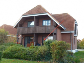 Small Sundblick by the sea in Lemkenhafen in Fehmarn